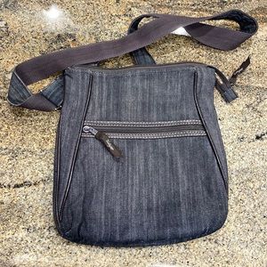Denim soft crossbody everyday purse.  Lots of pockets. Super cute.
